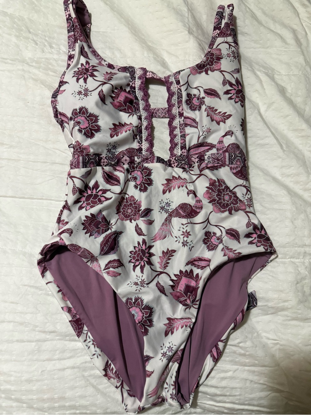 Becca one piece size m